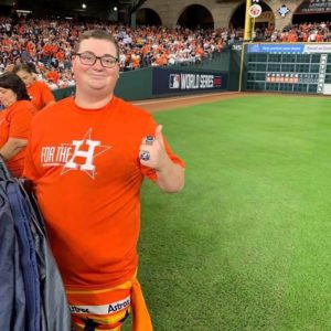 Blog - Koby Giving a Thumbs Up While Standing Beside the Feild at the 2021 World Series